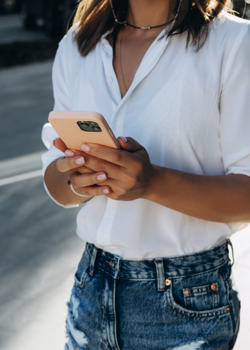 Woman holding a smartphone