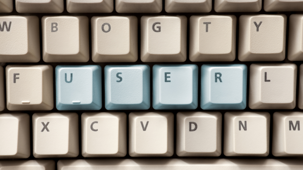 Computer keyboard with highlighted buttons saying "user"