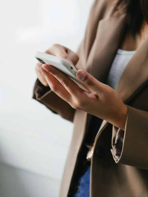 Woman holding a smartphone